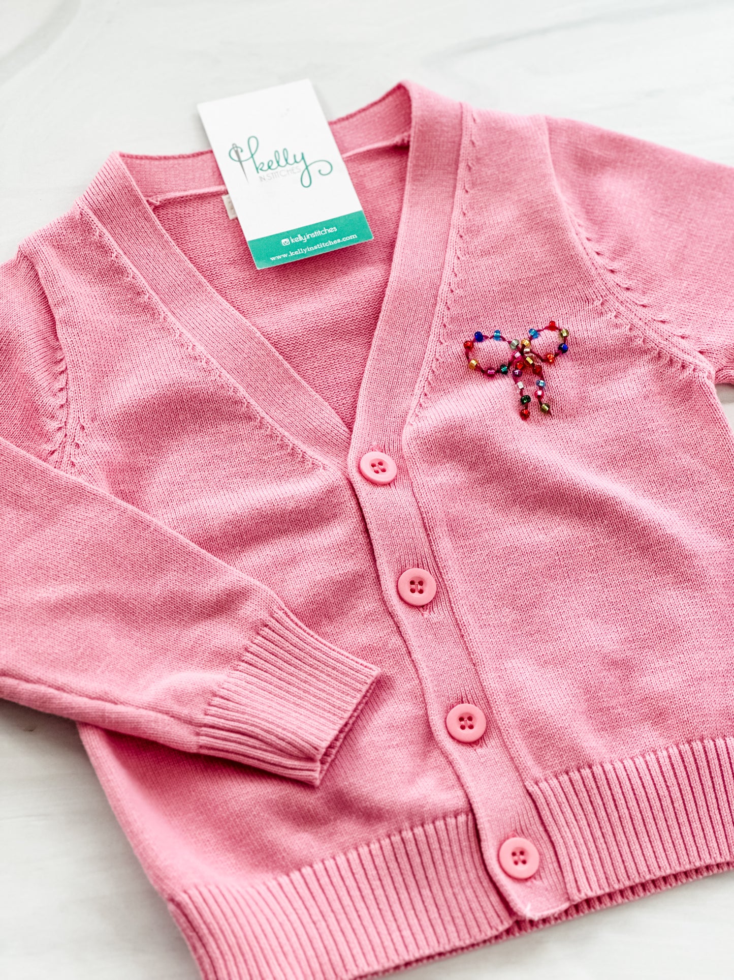 Beaded bow cardigan